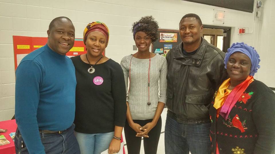 Community group gathered at a GHANDS outreach event